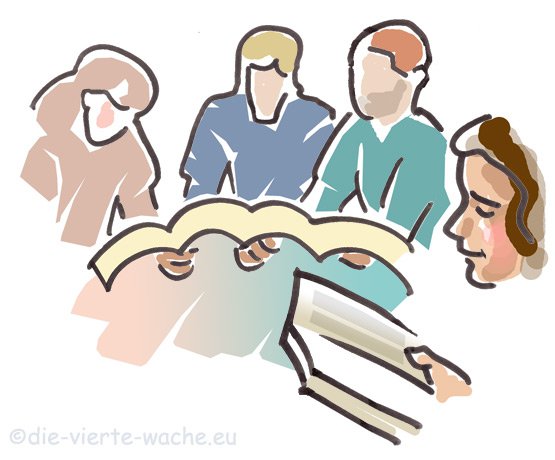 Eine Gruppe von Menschen beim Bibellesen