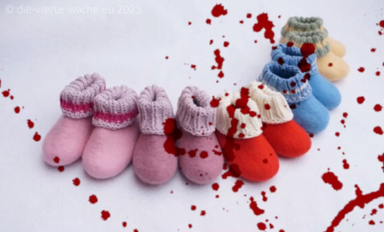 Babyschuhe mit roten Spritzern